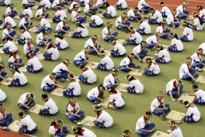 Students play the board game "Go", known as "Weiqi" in Chinese, during a competition to mark the 100-day countdown to the opening of Beijing Olympics at a primary school in Suzhou, Jiangsu province, in this April 30, 2008 file photo. REUTERS/China Daily/Files